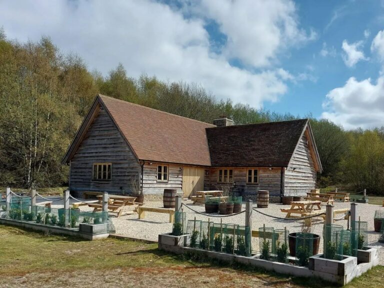 Photo of the Main building that is used as a tavern at the Huntley Wood site